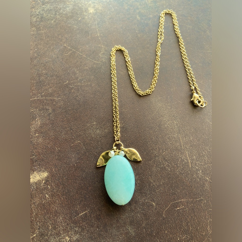 Beautiful turquoise gem necklace with gold chain